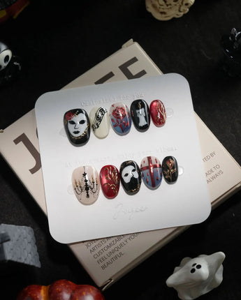 The Phantom handmade press-on nails in extra short oval shape by Joyee Nails