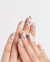 THE REVERIE custom-size nails with pearl white gel, carousel horses, and metallic accents