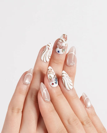 THE REVERIE custom-size nails with pearl white gel, carousel horses, and metallic accents