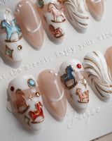 THE REVERIE nostalgic carousel nails with pearl white base and colorful embossed horses