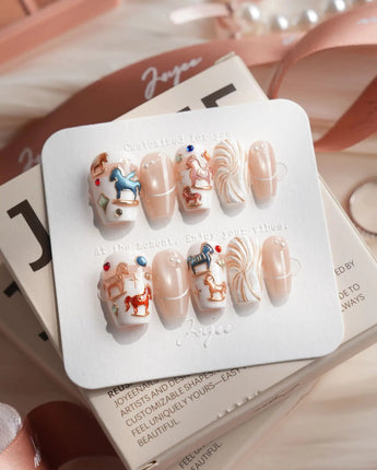 THE REVERIE short coffin nails with colorful 3D rocking horses and metallic outlines