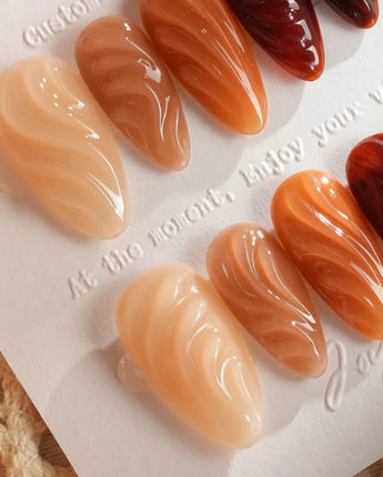 The Whole Fall press-on nails with amber caramel gradient and 3D syrup ripple gel texture