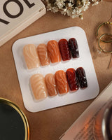 The Whole Fall press-on nails with amber caramel colors and sculpted syrup ripple texture