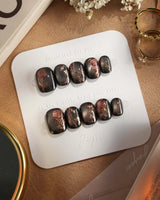 Thorned Spell press-on nails — black cat eye gold outline rose thorn design handmade nail art by Joyee Nails