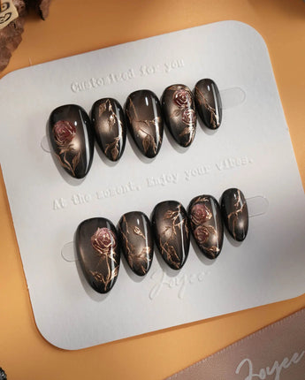 Thorned Spell press-on nails — black cat eye gold outline rose thorn design handmade nail art by Joyee Nails