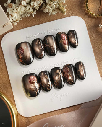 Thorned Spell press-on nails — black cat eye gold outline rose thorn design handmade nail art by Joyee Nails