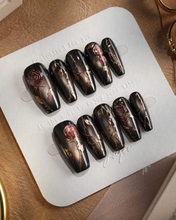 Thorned Spell press-on nails — black cat eye gold outline rose thorn design handmade nail art by Joyee Nails