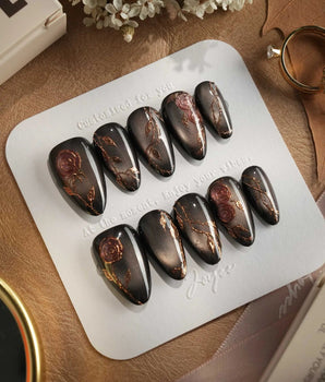 Thorned Spell press-on nails — black cat eye gold outline rose thorn design handmade nail art by Joyee Nails