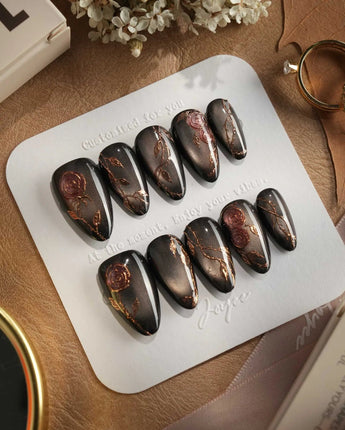 Thorned Spell press-on nails — black cat eye gold outline rose thorn design handmade nail art by Joyee Nails