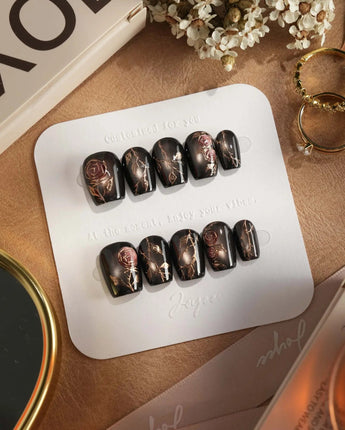 Thorned Spell press-on nails — black cat eye gold outline rose thorn design handmade nail art by Joyee Nails