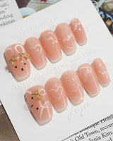 Thump Bunny short coffin press-on nails with glossy bunny-inspired cat-eye art