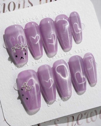 Thump Bunny_Taro press-on nails in medium coffin shape — Lavender Purple, Heart Magnet Cat Eye.