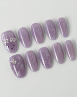 Thump Bunny_Taro press-on nails in medium oval shape — Lavender Purple, Heart Magnet Cat Eye.
