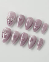 Thump Bunny_Taro press-on nails in short stiletto shape — Lavender Purple, Heart Magnet Cat Eye.