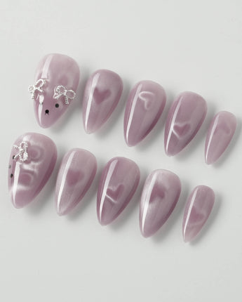Thump Bunny_Taro press-on nails in short stiletto shape — Lavender Purple, Heart Magnet Cat Eye.