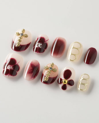 Tip Burgundy Nails in extra short oval shape with burgundy French tips and floral accents