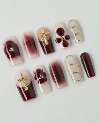 Tip Burgundy Nails in medium square shape with deep red tips and delicate gold accents