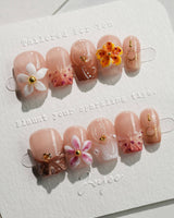 Tropical Nails Vibes press-on tropical manicure with bold beach flower design