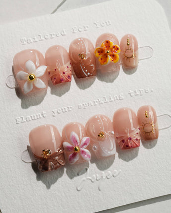 Tropical Nails Vibes press-on tropical manicure with bold beach flower design