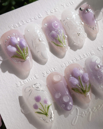 Tulip- Glow up nail art close-up showing Romantic Lilac Purple, 3D Tulips & Sequin Accents. details
