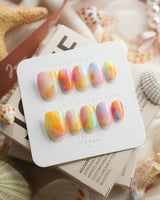 Tutti Frutti rainbow gradient press-on nails in extra short oval shape