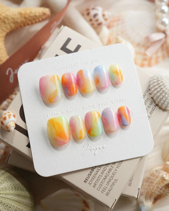 Tutti Frutti rainbow gradient press-on nails in extra short oval shape