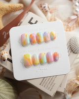 Tutti Frutti rainbow gradient press-on nails in extra short squoval shape