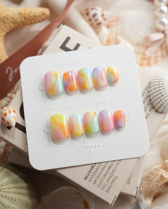 Tutti Frutti rainbow gradient press-on nails in extra short squoval shape