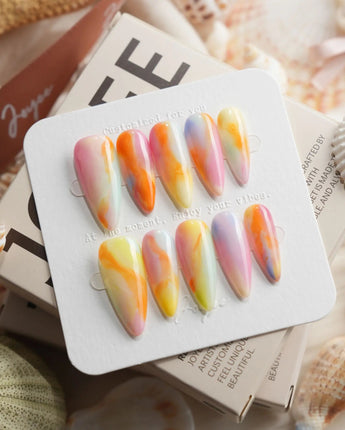 Tutti Frutti rainbow gradient press-on nails in medium stiletto shape