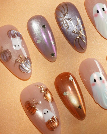 Twilight Pumpkin press on nails with chrome pumpkins, pastel ghosts and gold stars on lavender and copper cat eye - image 3