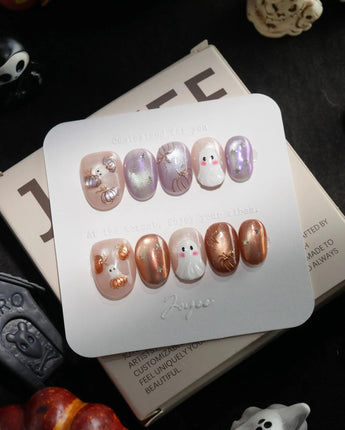 Twilight Pumpkin handmade press-on nails in extra short oval shape by Joyee Nails