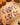 Twilight Pumpkin press on nails with chrome pumpkins, pastel ghosts and gold stars on lavender and copper cat eye - image 1