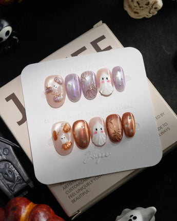 Twilight Pumpkin handmade press-on nails in short oval shape by Joyee Nails