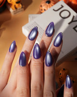 Ultraviolet press on nails in bright violet cat eye with a thin silver chrome edge along the tip - image 1