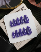 Ultraviolet press on nails in bright violet cat eye with a thin silver chrome edge along the tip - image 2
