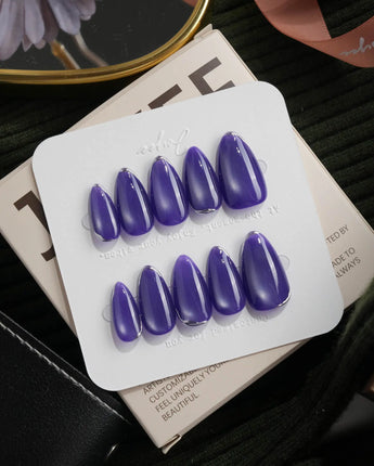Ultraviolet press on nails in bright violet cat eye with a thin silver chrome edge along the tip - image 2