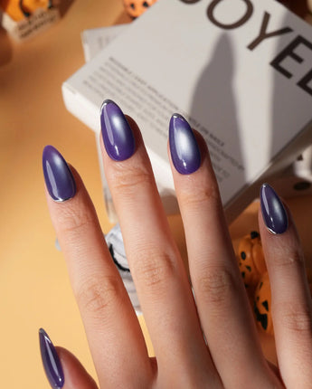 Ultraviolet press on nails in bright violet cat eye with a thin silver chrome edge along the tip - image 3