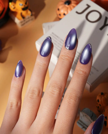 Ultraviolet press on nails in bright violet cat eye with a thin silver chrome edge along the tip - image 5