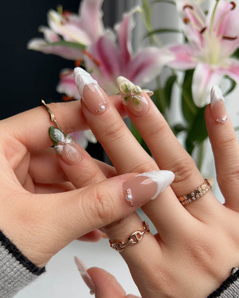 Duchess Olive press-ons with olive green gel color, 3D flowers, and glossy French tips