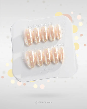 Lemon soda handmade press-on nails featuring Pearly Aurora Nude, Retro Milky White Polka Dots