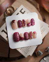 Velvet Flow short square press-on nails with berry red cat-eye texture and butterfly wings