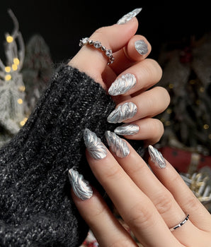 Velvet Frost handmade press-on nails featuring 3D Spiral Texture, Silver Glitter Effect.