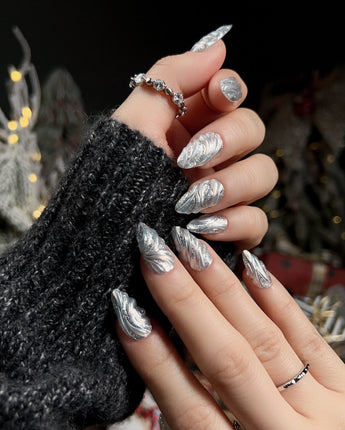 Velvet Frost handmade press-on nails featuring 3D Spiral Texture, Silver Glitter Effect.