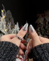 Velvet Frost nail art close-up showing 3D Spiral Texture, Silver Glitter Effect. details