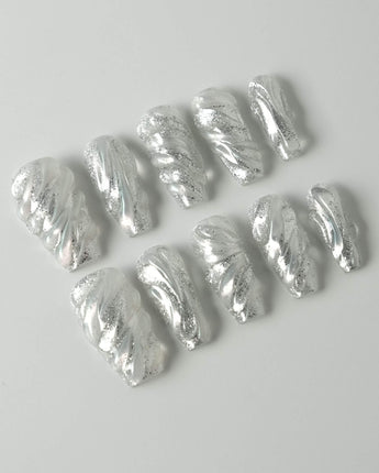 Velvet Frost press-on nails in medium coffin shape — 3D Spiral Texture, Silver Glitter Effect.