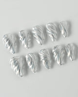 Velvet Frost press-on nails in short stiletto shape — 3D Spiral Texture, Silver Glitter Effect.