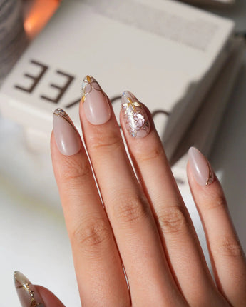 Venetian Glass handmade press-on nails with delicate gold leadwork and soft nude base