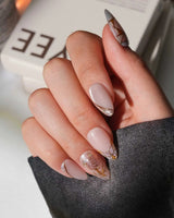 Venetian Glass L press-on nails in short almond with pink glass panels and gold accents