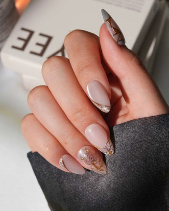 Venetian Glass L press-on nails in short almond with pink glass panels and gold accents