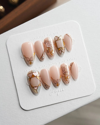 Venetian Glass M press-on nails in short almond with blush roses and champagne glitter